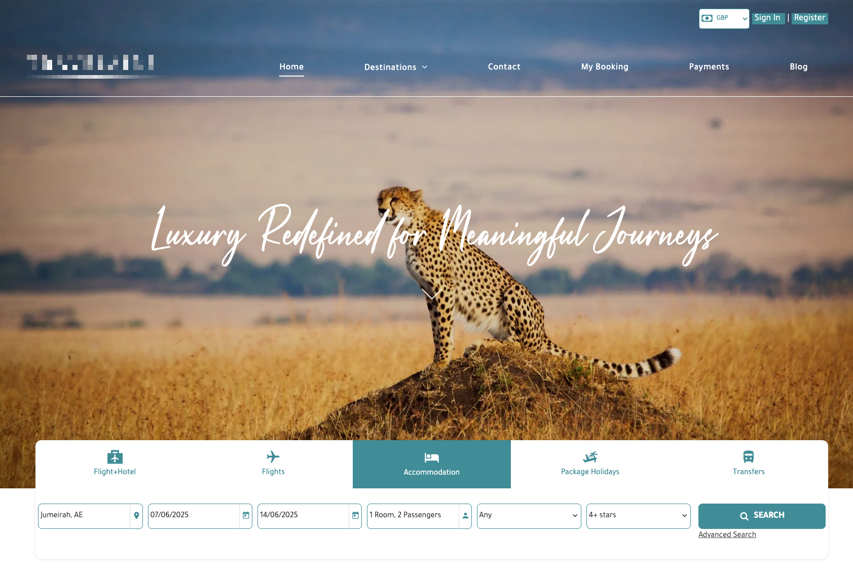 A cheetah is sitting on top of a grass covered hill.