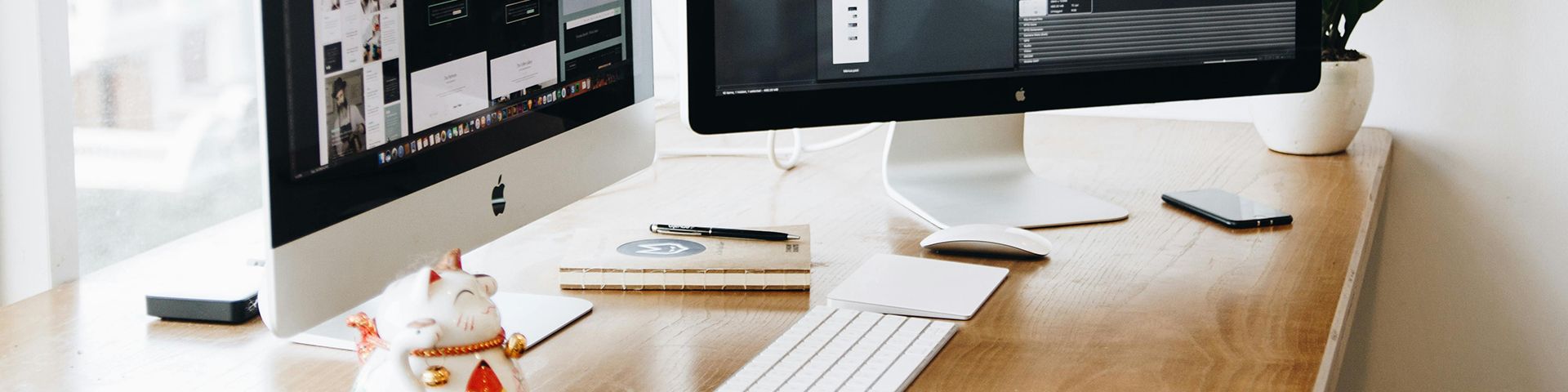 Man working at a computer building a website