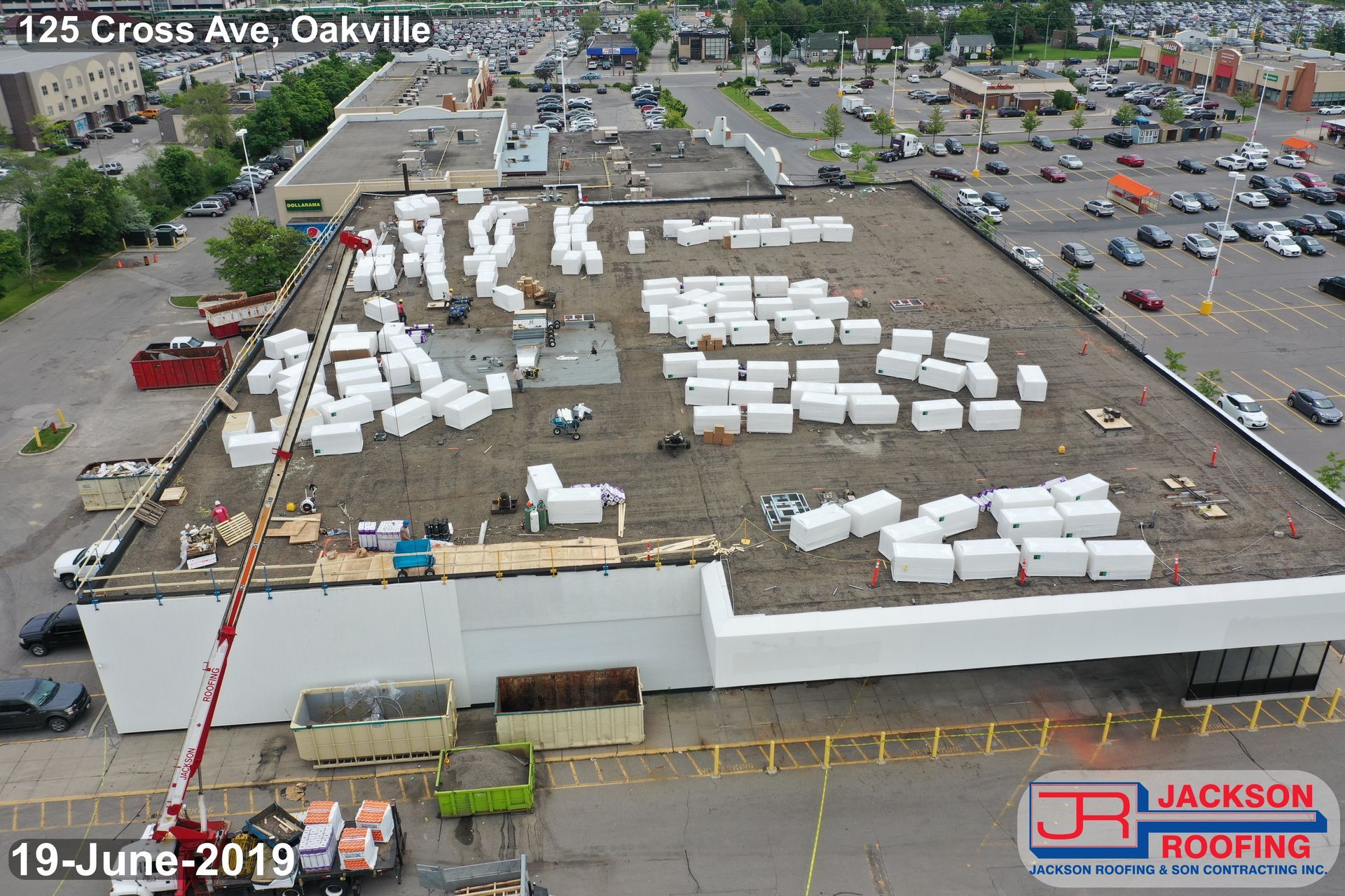 An aerial view of a large building under construction.