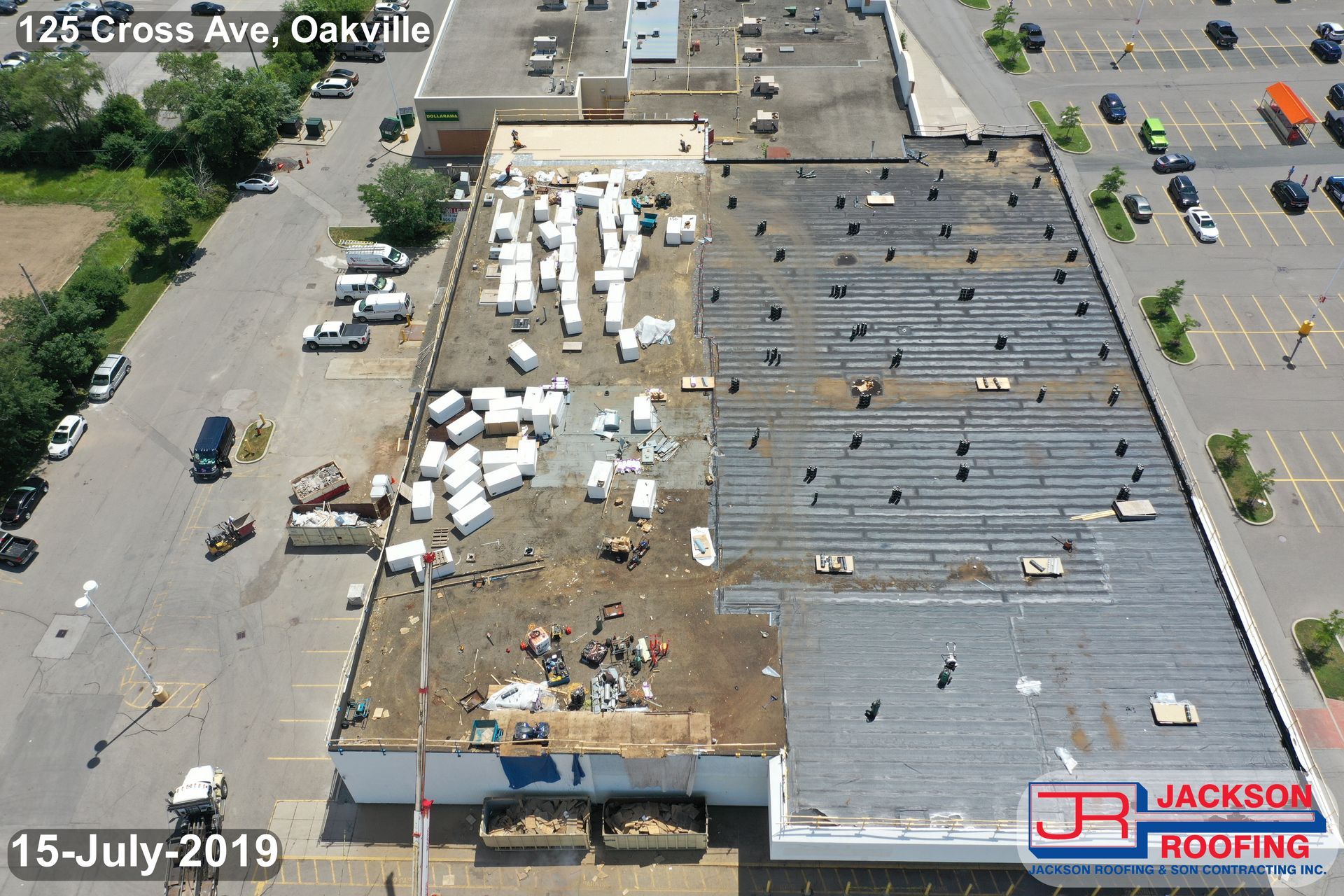 An aerial view of a building that is being remodeled by jackson roofing