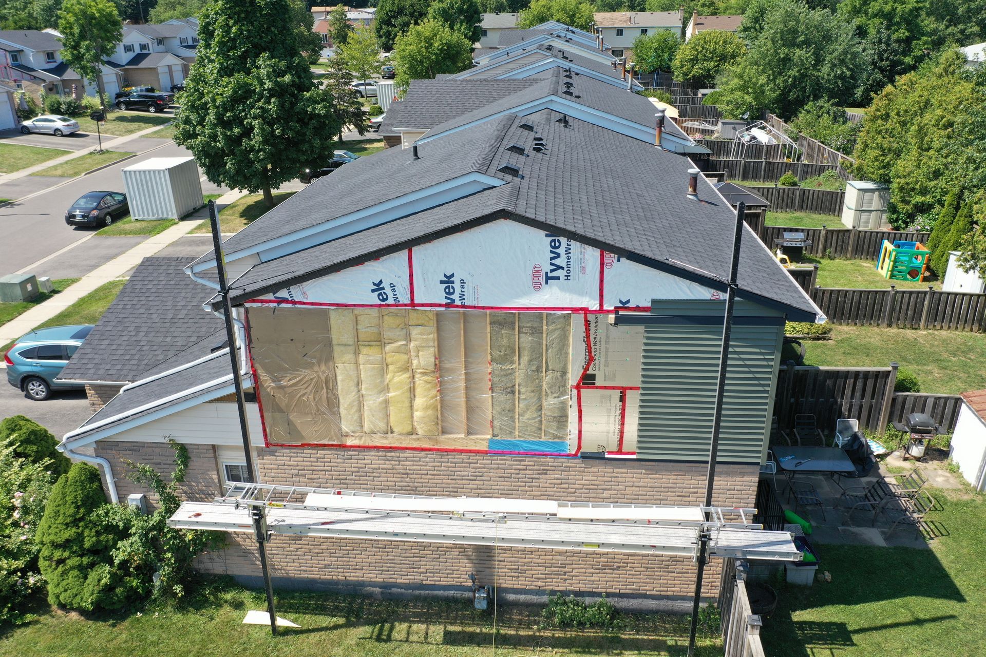An aerial view of a house that is being remodeled.