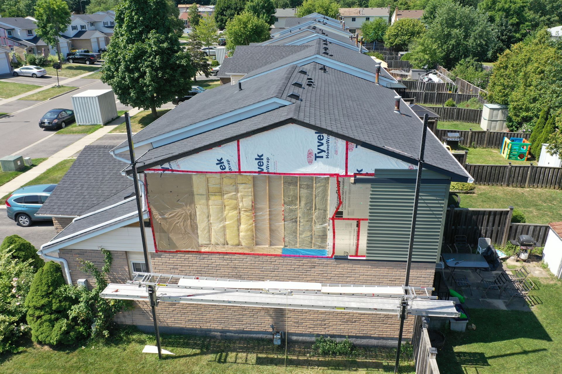 An aerial view of a house that is being remodeled