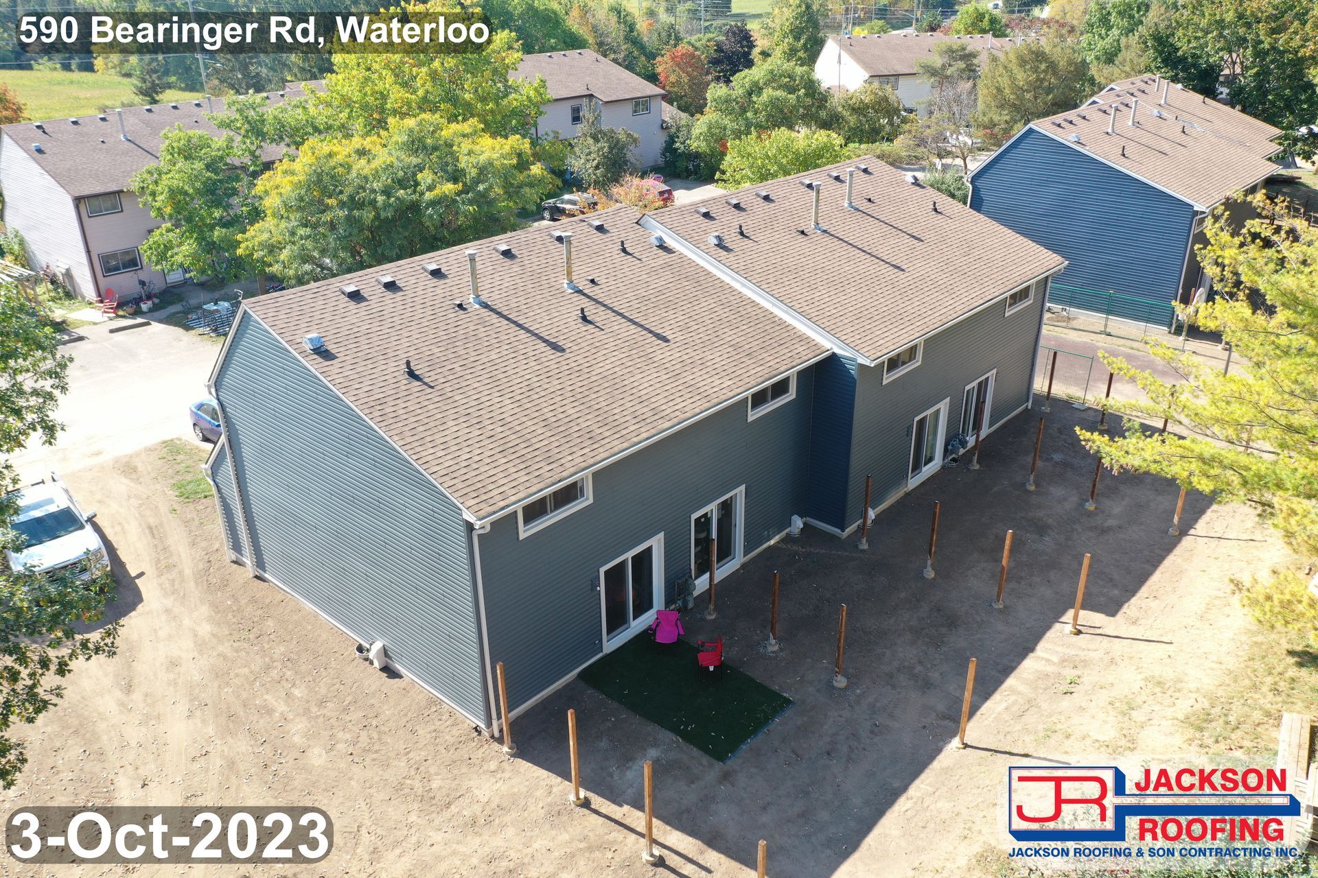 An aerial view of a house with a roof that is being built.