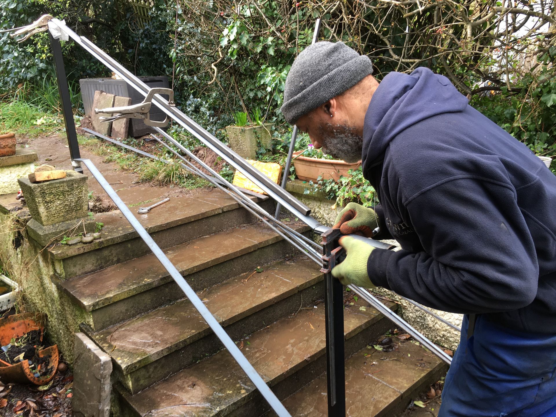 jOHN WORKING ON RAILINGS