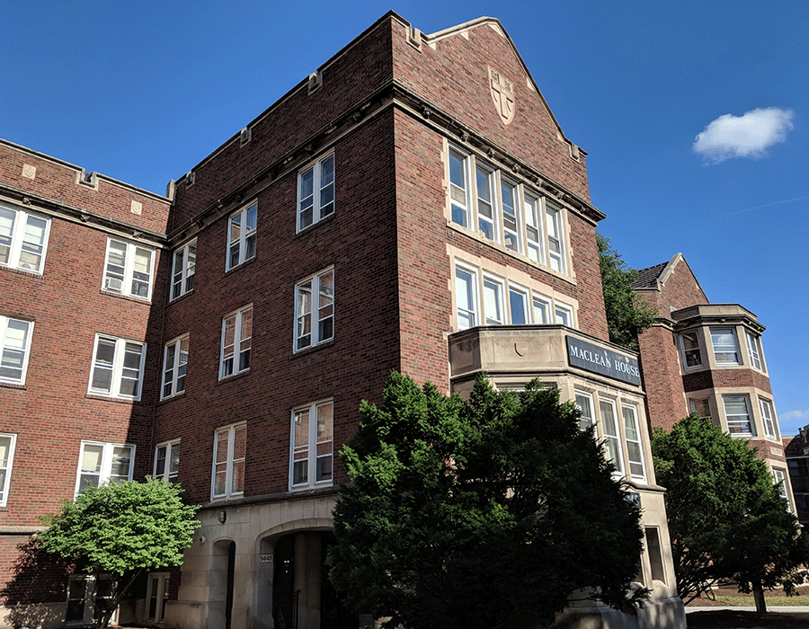 A large brick building with a clock on the top of it