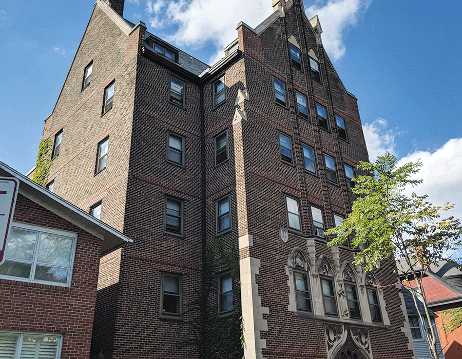 A large brick building with a lot of windows