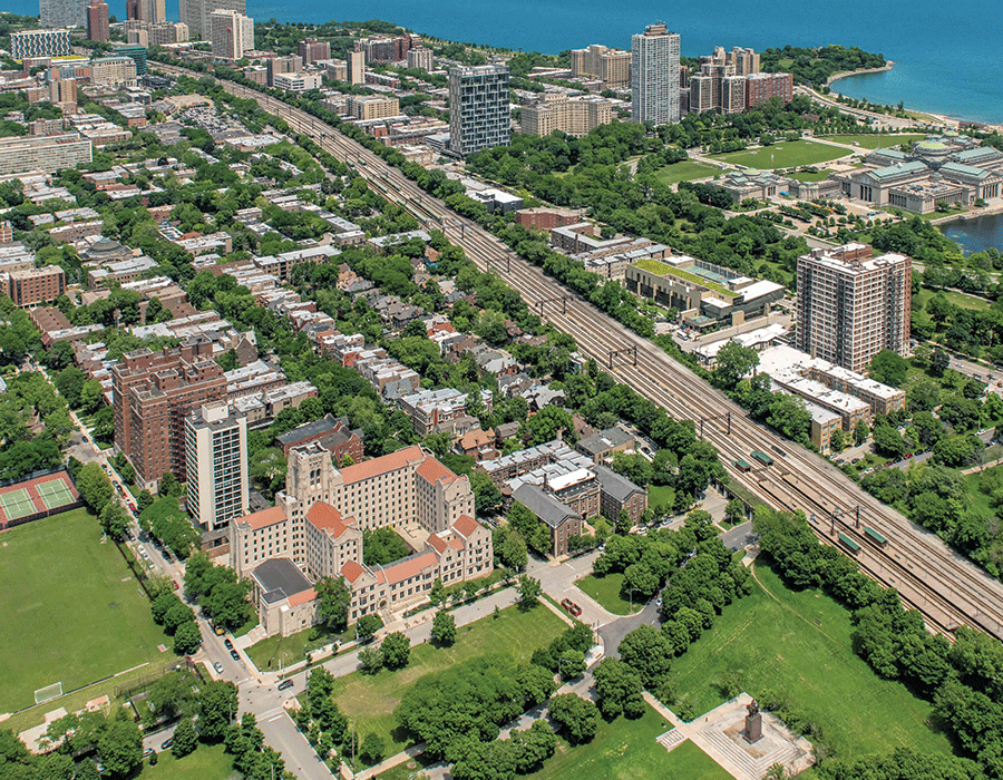 An aerial view of a city with lots of buildings and trees