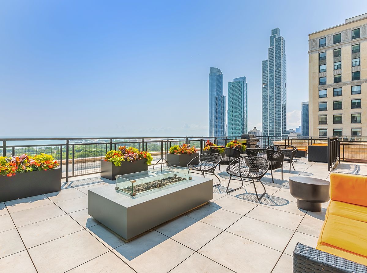 There is a fire pit on the roof of a building.