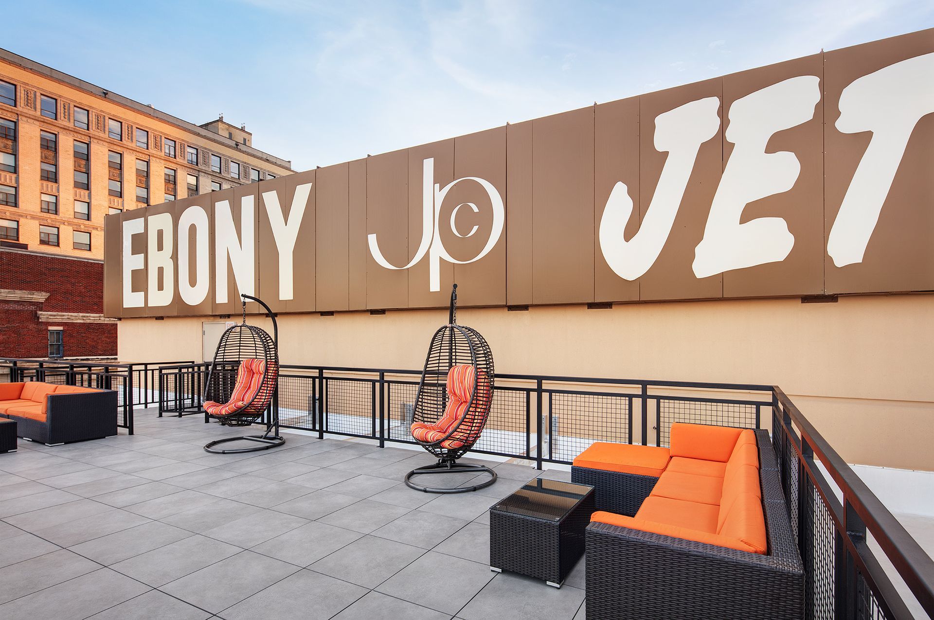 A balcony with a large sign that says ebony jet