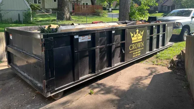 Black dumpster with 