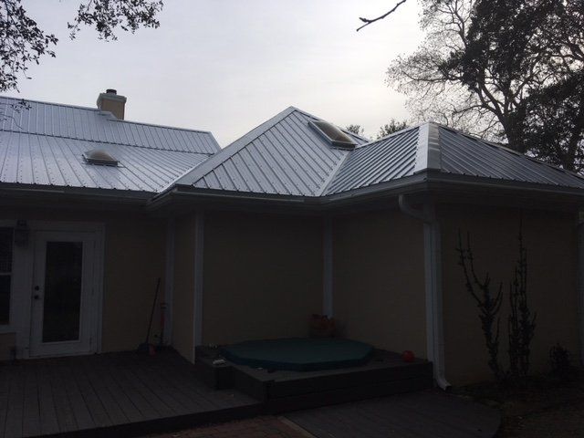 Roofing Images — Metal Roof Installed in House  in Walton Beach, FL