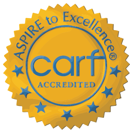 A seal that says aspire to excellence carf accredited