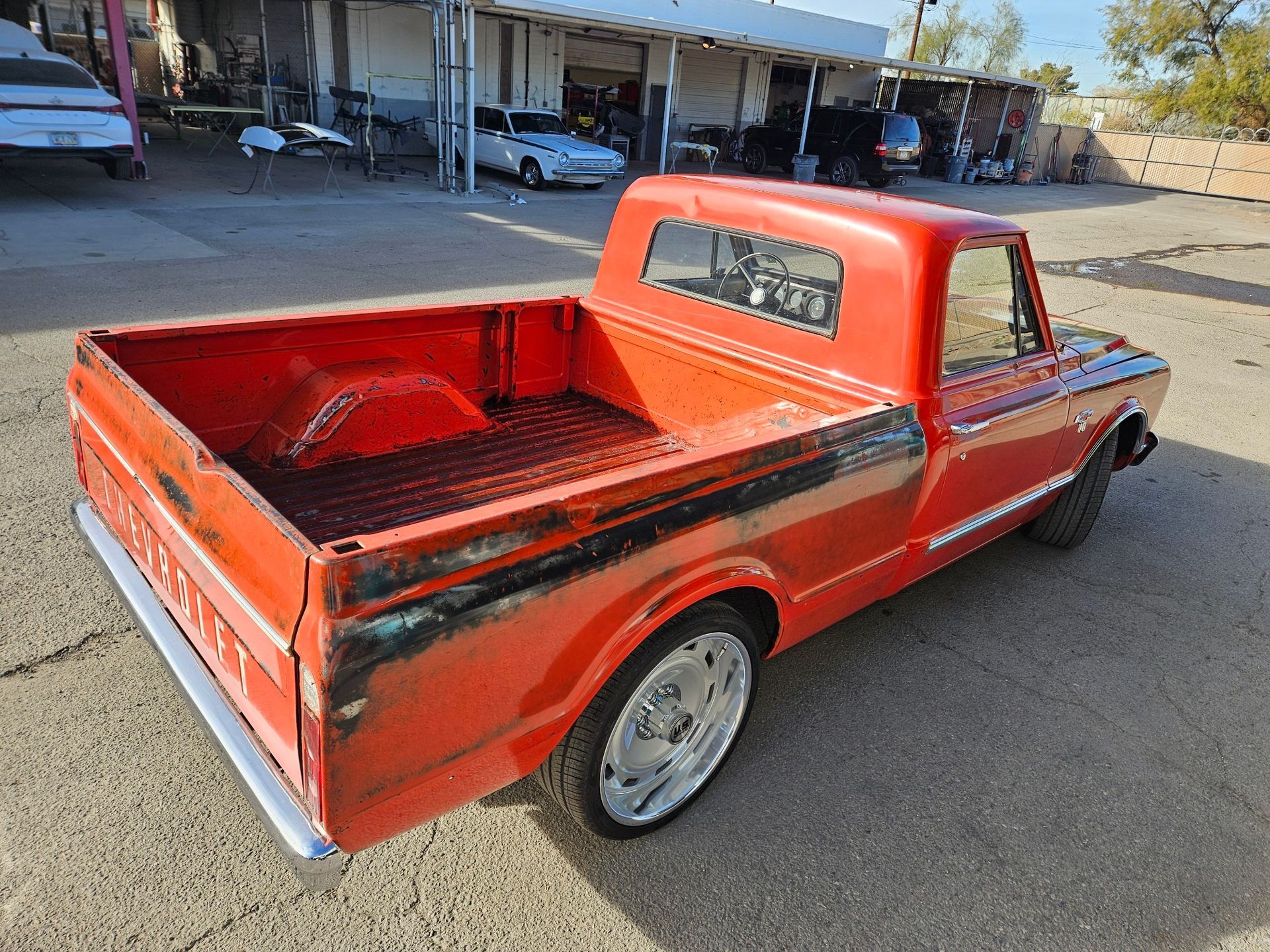 a orange classic truck is parked