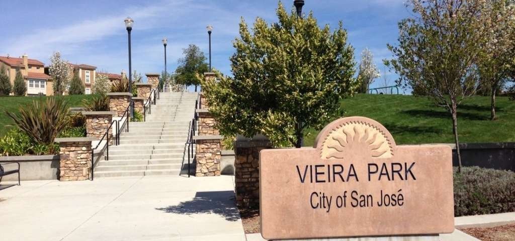 Vieira Park sign, with stairs and a grassy hill in San Jose, California.