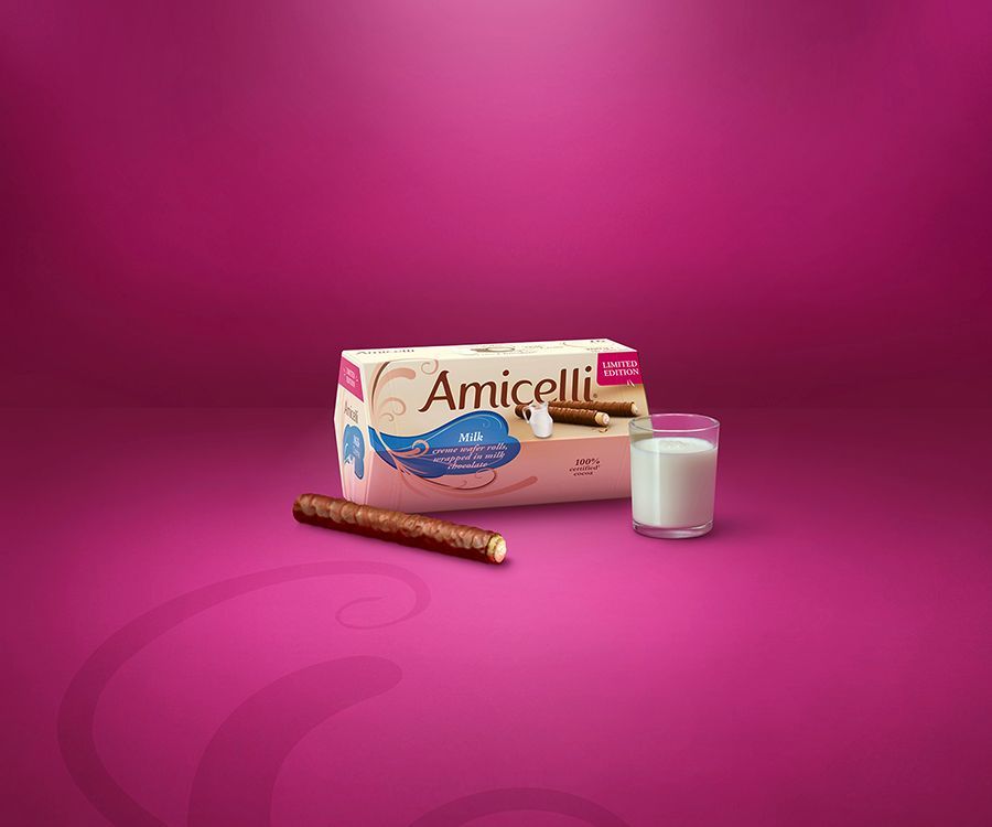 A box of amicelli milk wafer rolls and a glass of milk on a purple background.