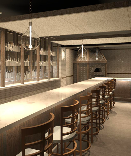 Bar interior with long counter, wooden stools, shelves with bottles, brick oven, and pendant lights.