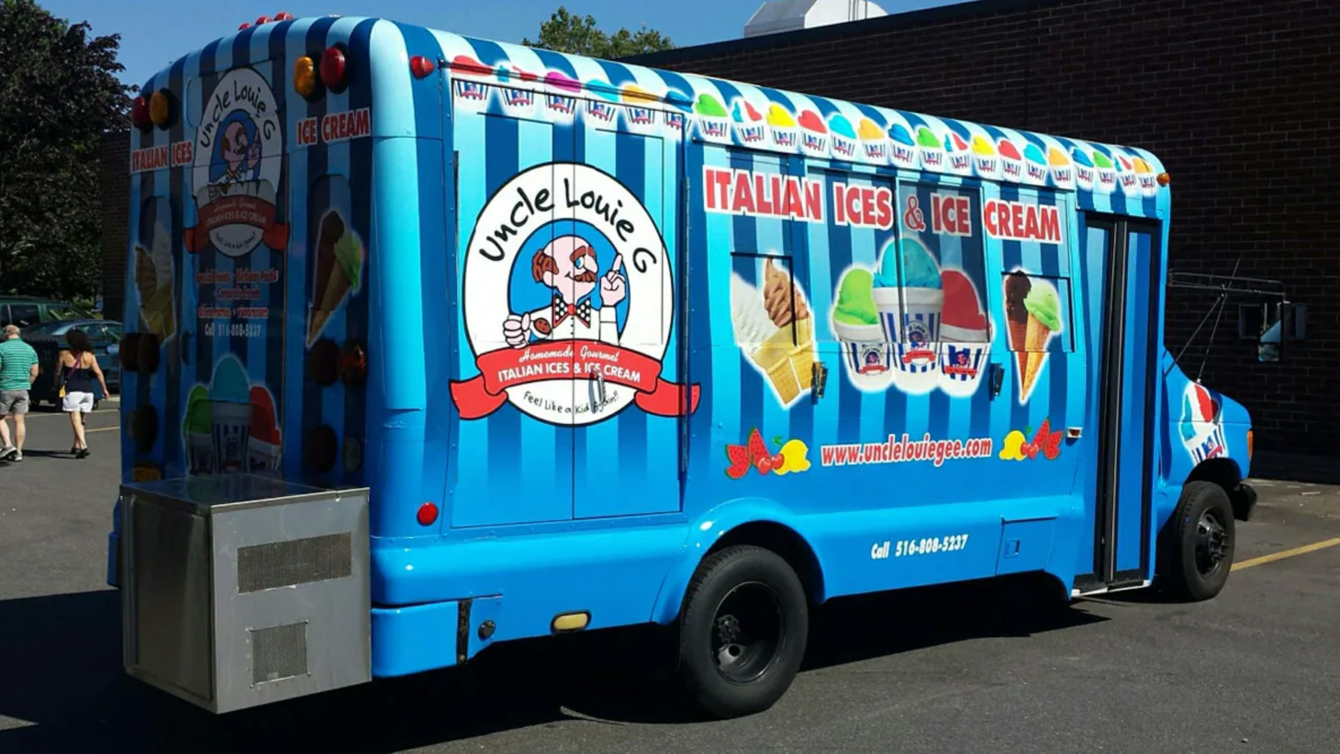 Blue and white striped ice cream truck with 
