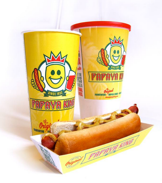 Papaya King hot dog and drinks. Yellow cups with logo, hot dog in tray.