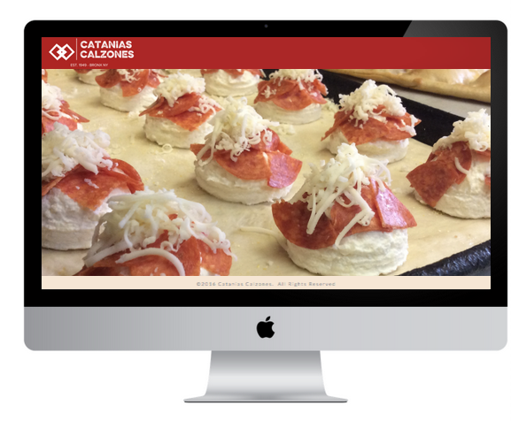 A computer screen displays food, likely pizza bites, with pepperoni and cheese.