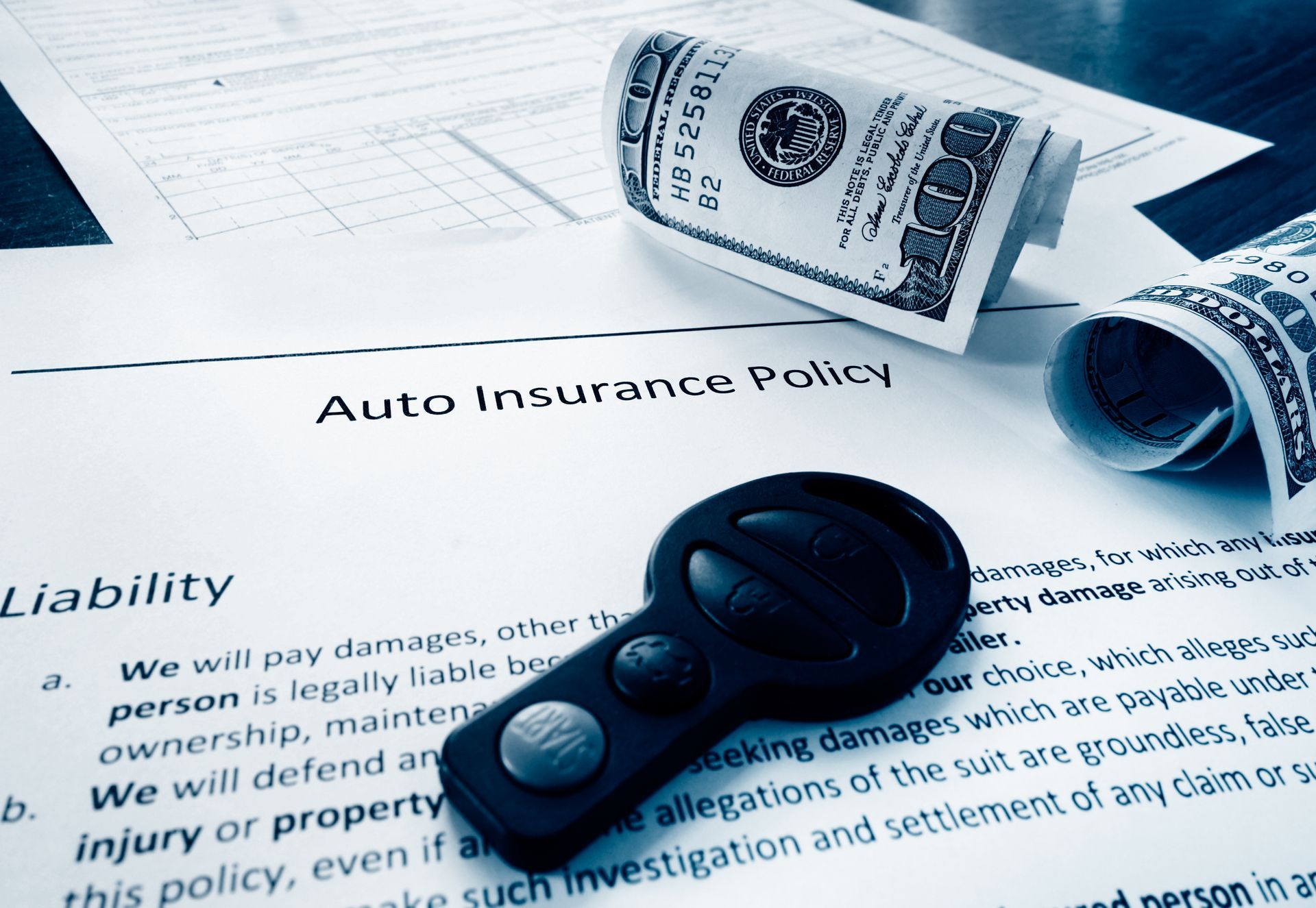 Document that reads ‘Auto Insurance Policy’
