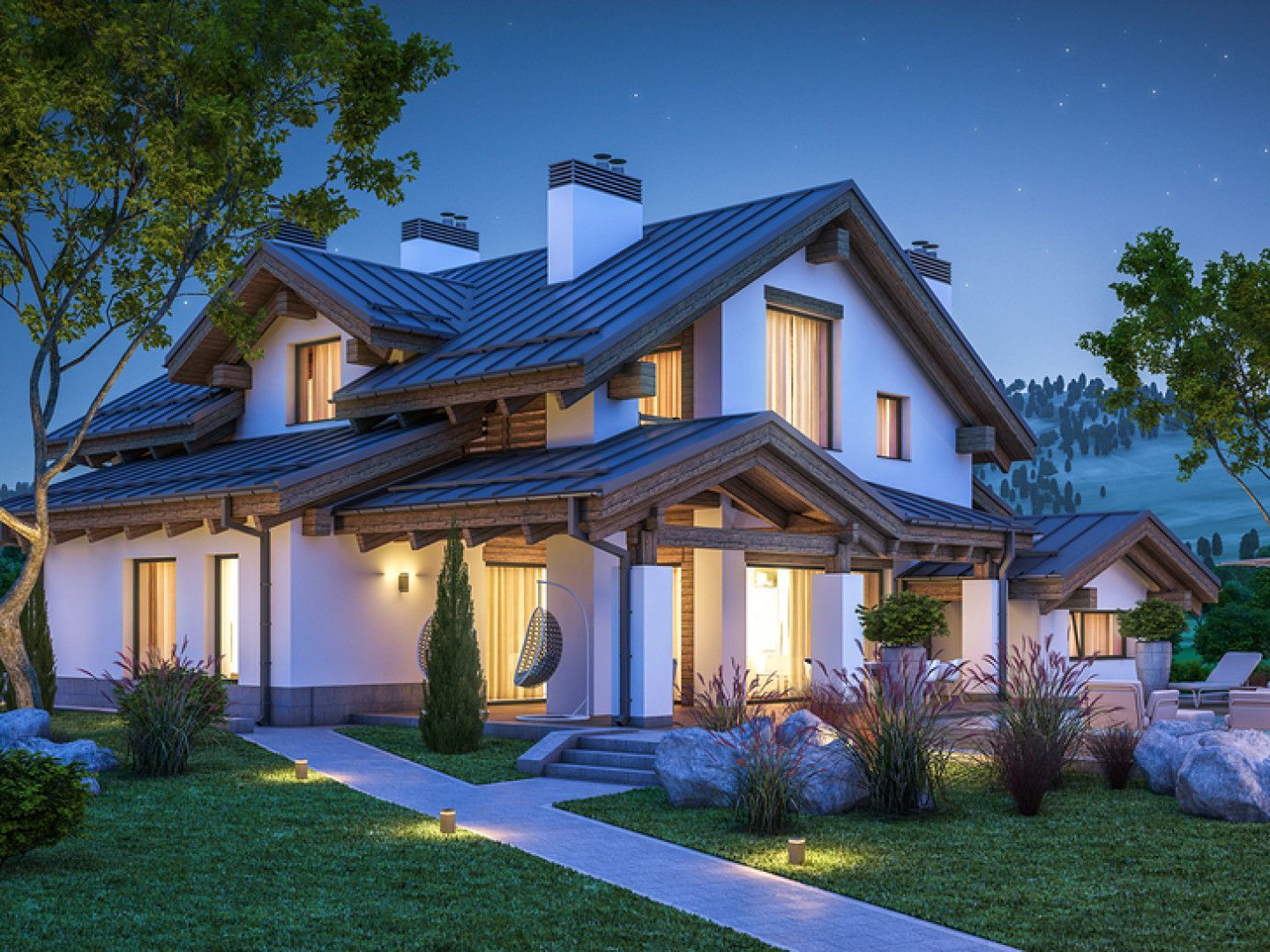 Large White House with A Black Roof Is Lit up At Night