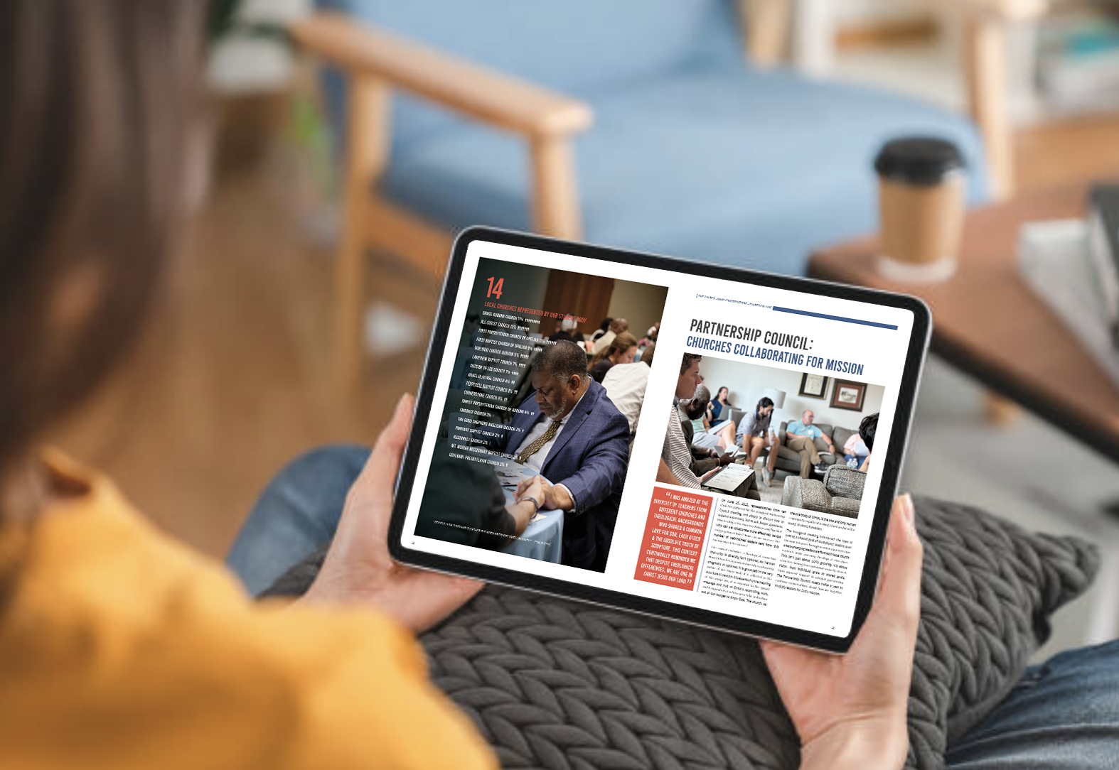 Woman reading a digital magazine on a tablet while relaxing on a couch.
