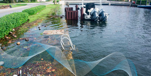 A large brick building with a furniture store in front of it