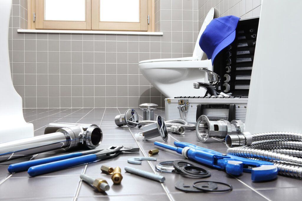 Plumber Tools And Equipment In A Bathroom, Plumbing Repair Services - Doug Turner Plumbing Co.