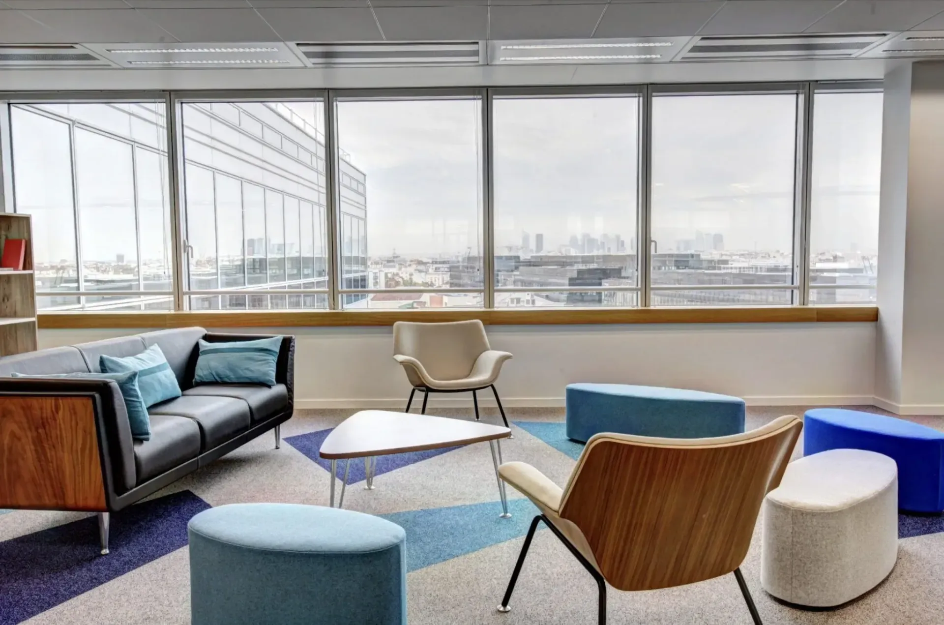 A man is installing a window in a house.