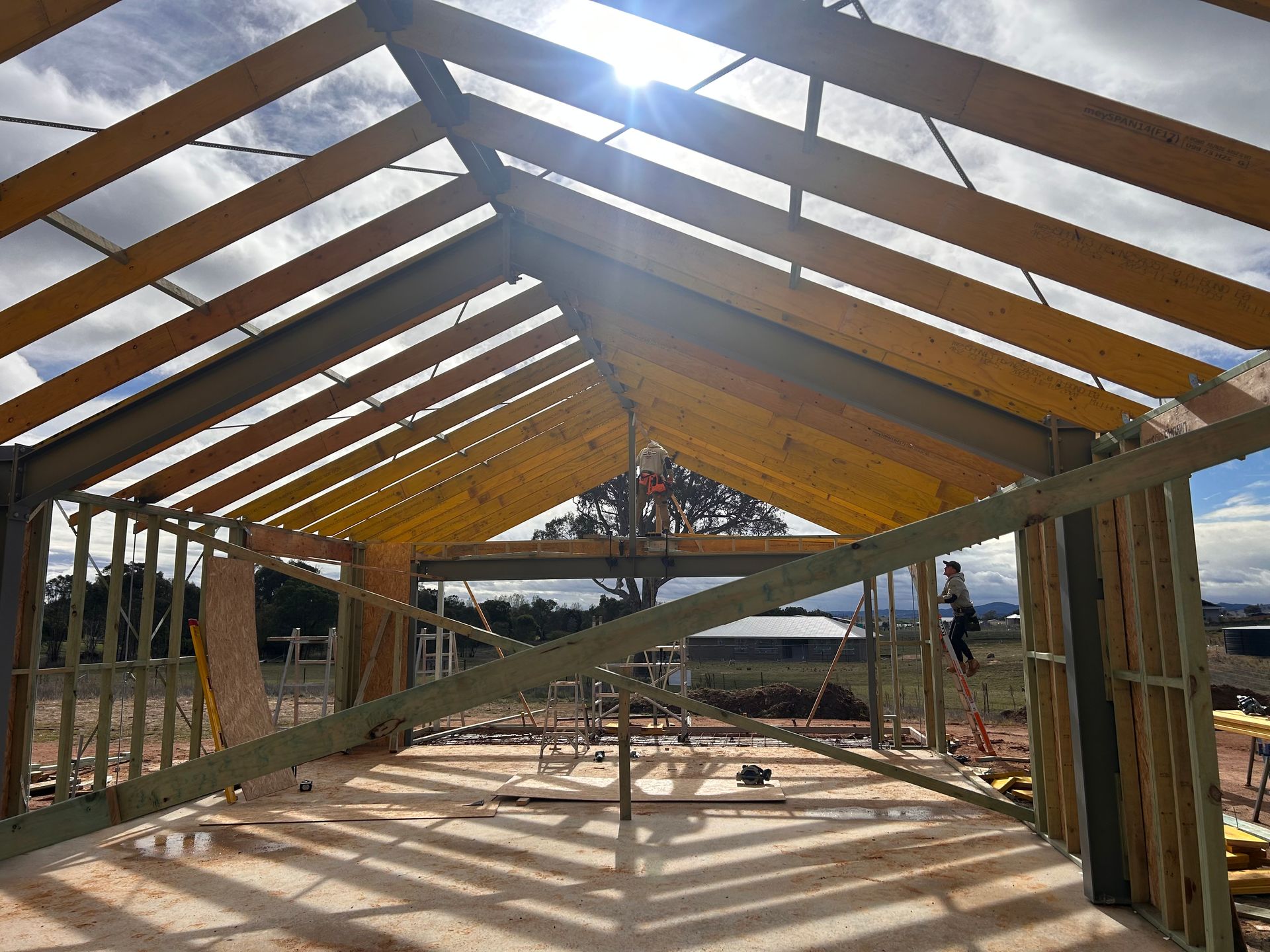 The Framing Of A House Being Built In A Farm Area — R3 Construction In O'Connor, ACT