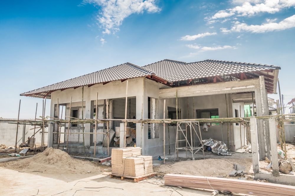 A House is Being Built With Scaffolding Around It — R3 Construction In O'Connor, ACT