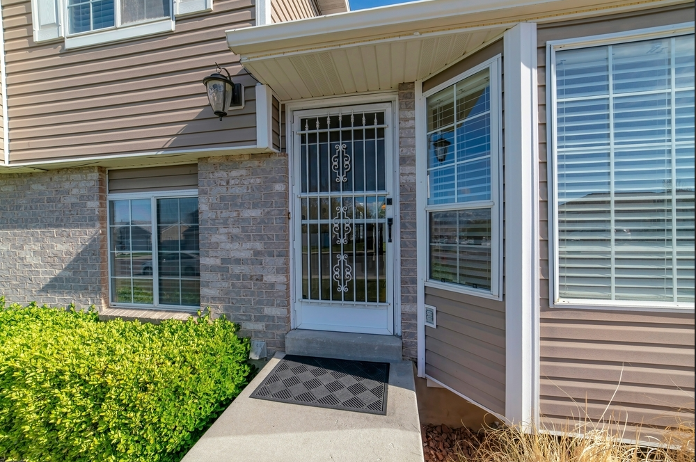 The Front Door of a House With a Walkway Leading to It — R3 Construction In South Coast, NSW