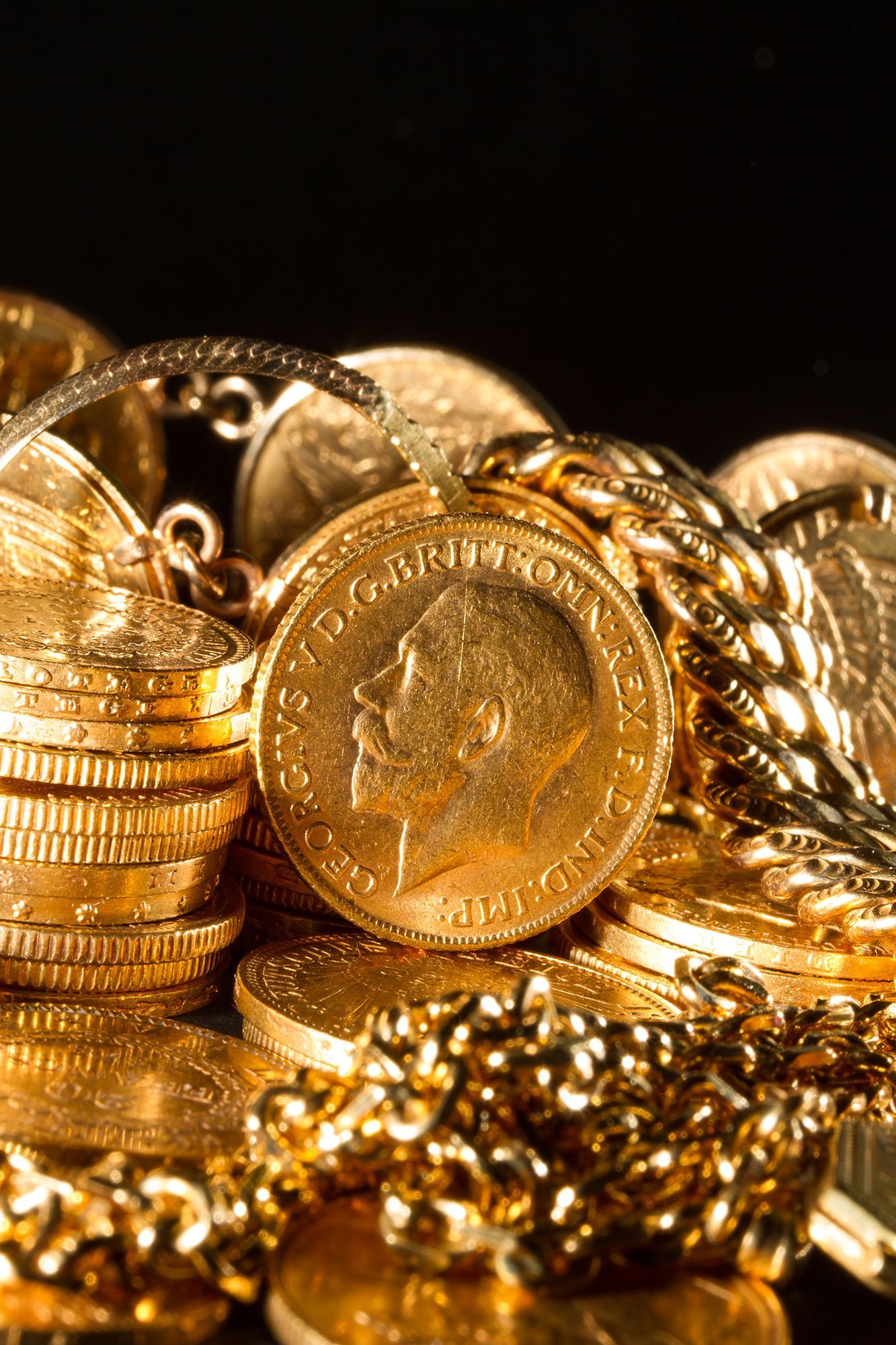 lingotto con monete in oro