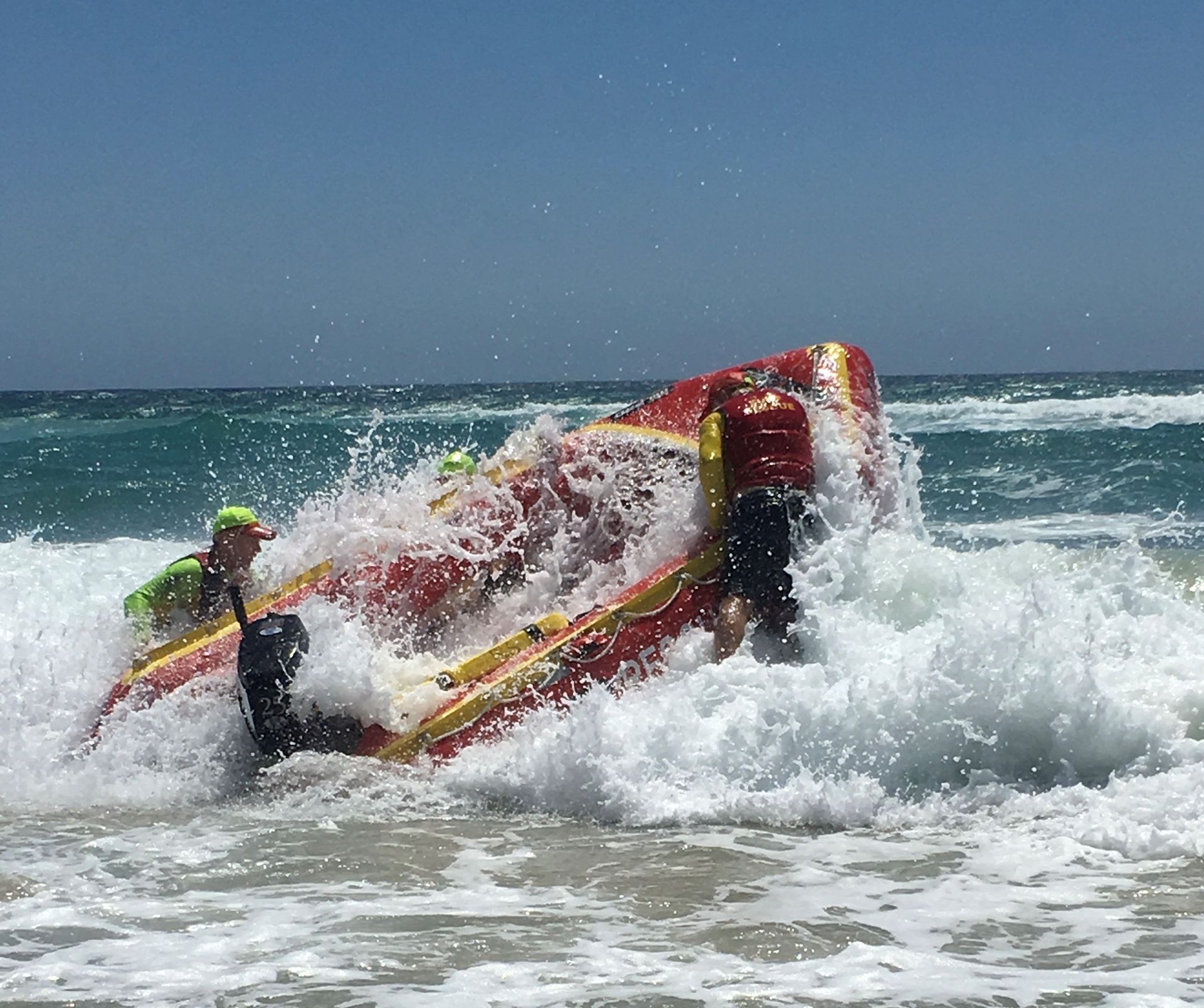 A group of people are riding a boat in the ocean.