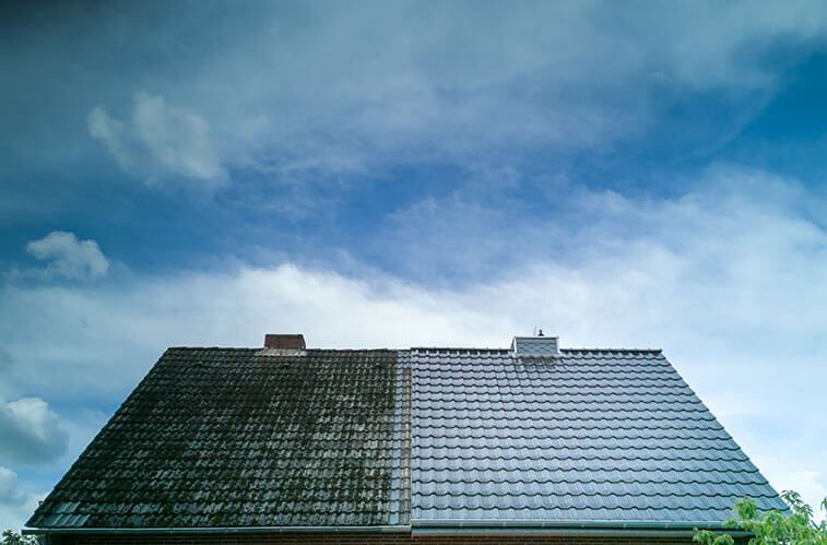 A before and after picture of a roof with a blue sky in the background.