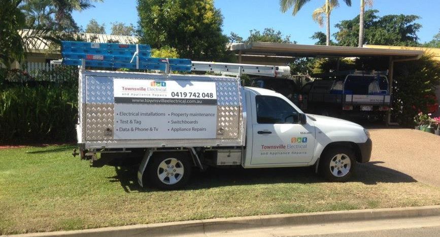 White Pick Up Vehicle Service — Townsville Electrical and Appliance Repairs In Garbutt QLD