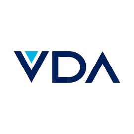 A blue and white logo for vda on a white background.
