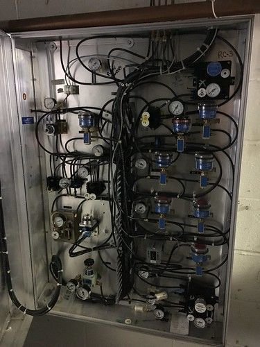 A box filled with lots of wires and gauges.