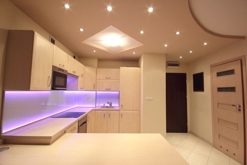 A Kitchen With Purple Lights On The Walls And Ceiling — EESI Electrical Contractors In Evans Head, NSW