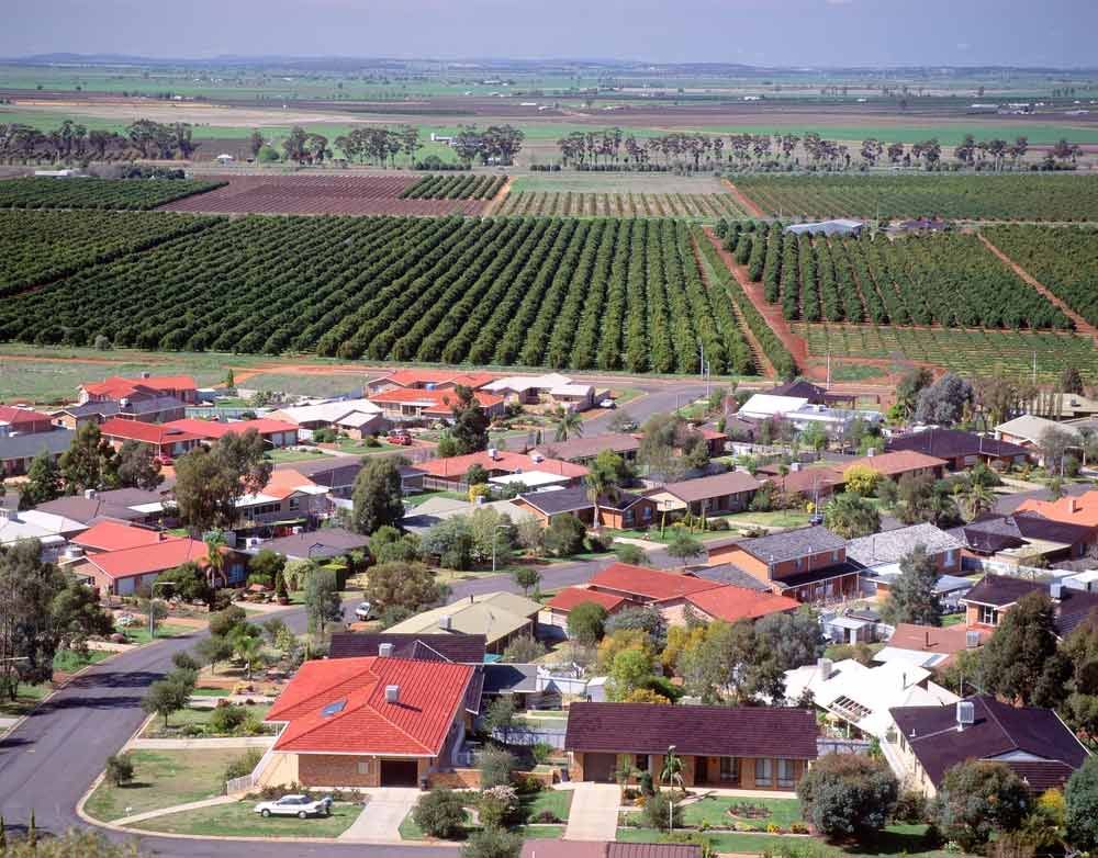 An Aerial View Of A Residential Area Surrounded By Fields — EESI Electrical Contractors In Wollongbar, NSW