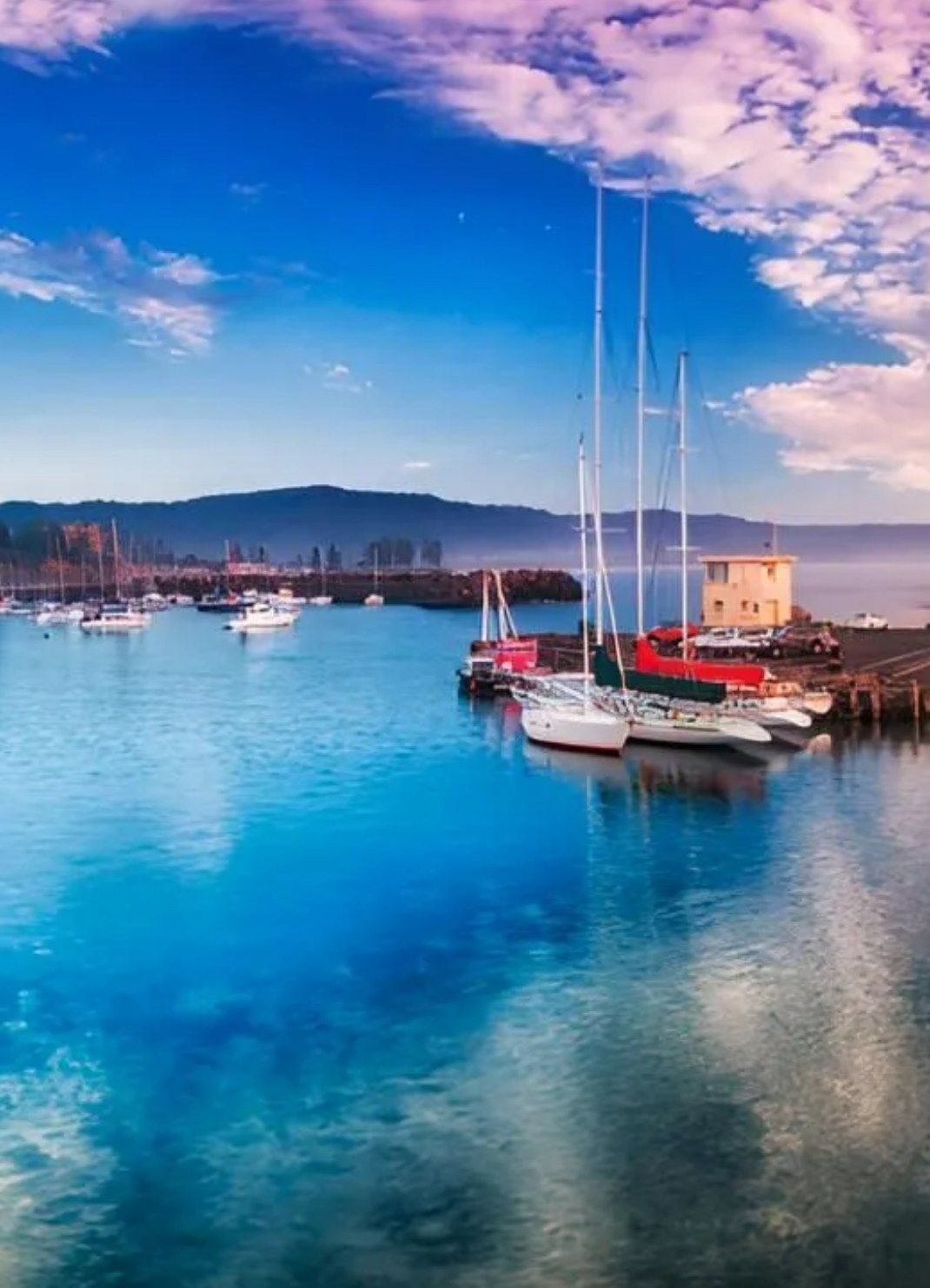 Harbor View With Boats And Colorful Sky — JSF Interiors Goulburn in Wollongong, NSW