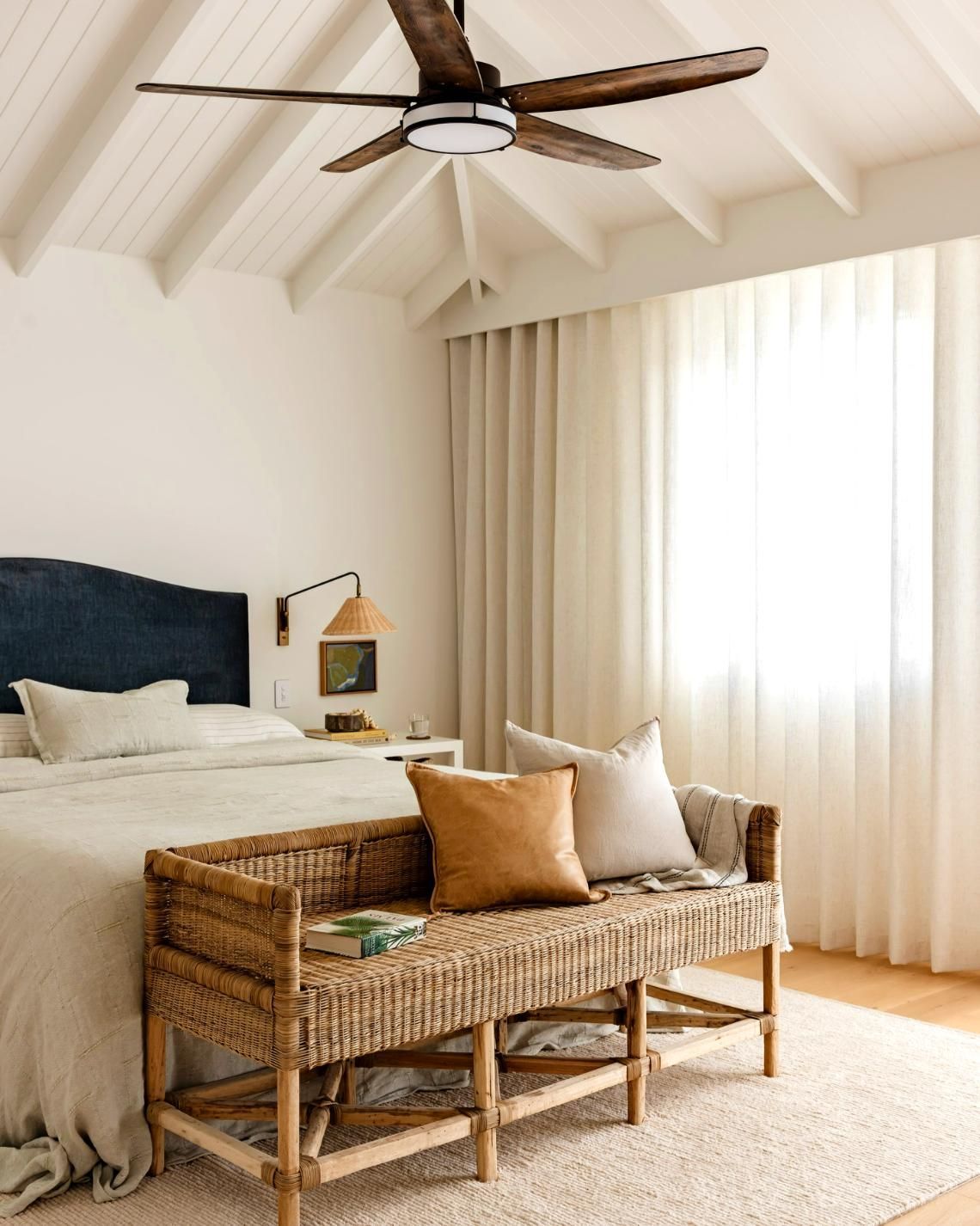 Bedroom With Woven Bench and Sheer Curtains — JSF Interiors Goulburn in Shellharbour, NSW