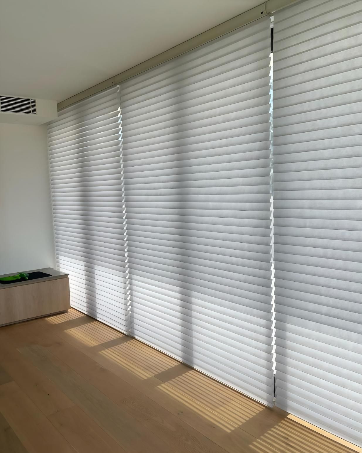 White Pleated Blinds Cover Large Window — JSF Interiors Goulburn in Goulburn, NSW