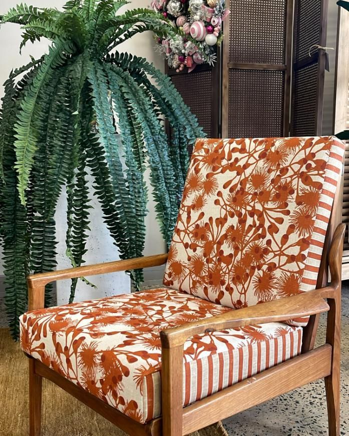 Chair With Orange Floral Cushions And Striped Side — JSF Interiors Goulburn in Goulburn, NSW