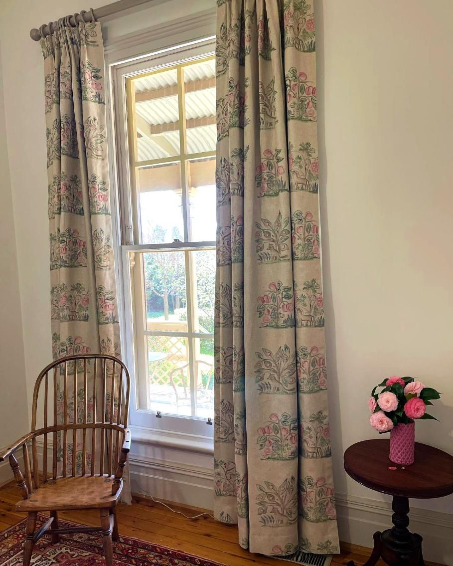 Window With Floral Curtains And Chair — JSF Interiors Goulburn in Berry, NSW