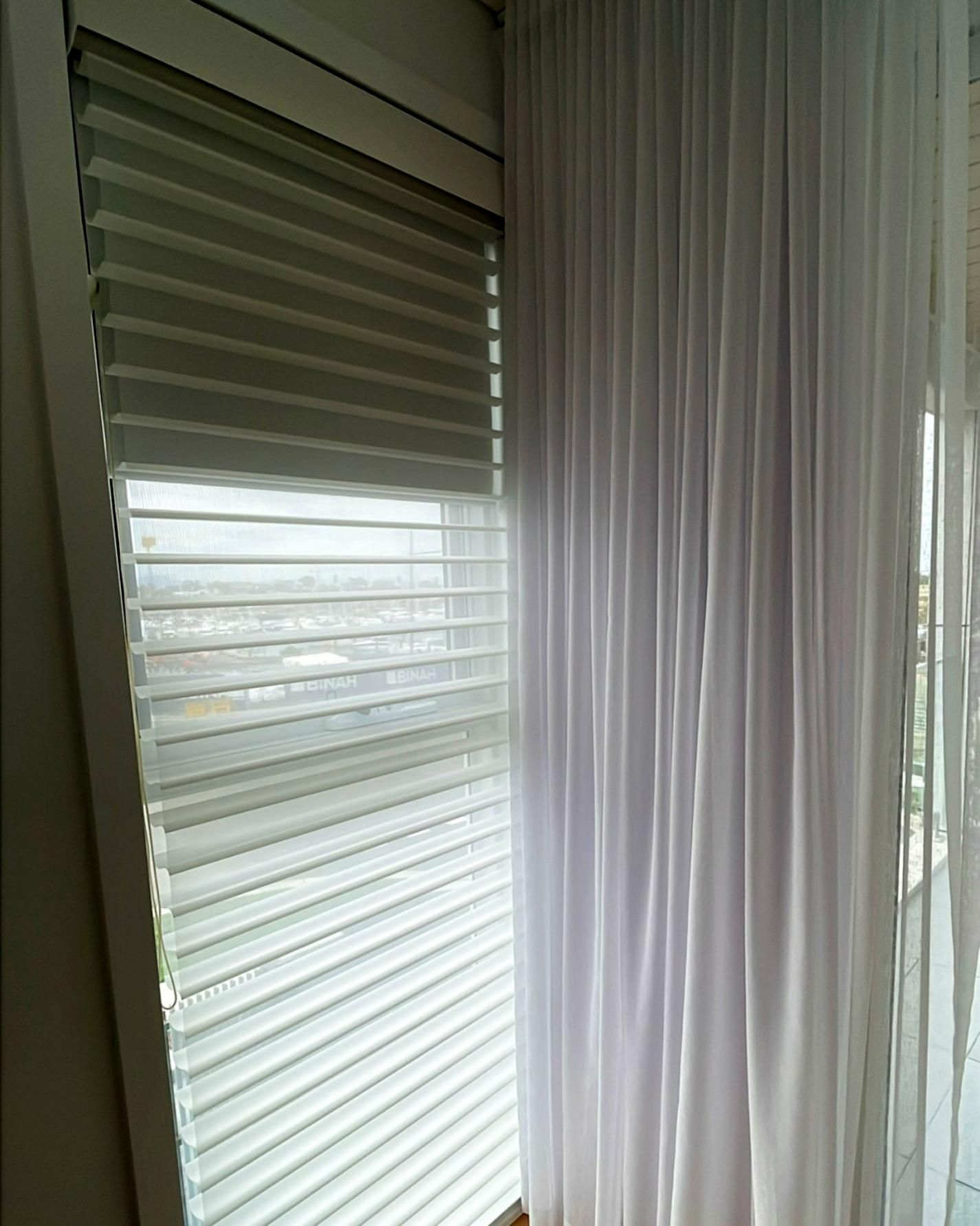 Window With Light Green Pleated Blind And Sheer Curtains — JSF Interiors Goulburn in Goulburn, NSW