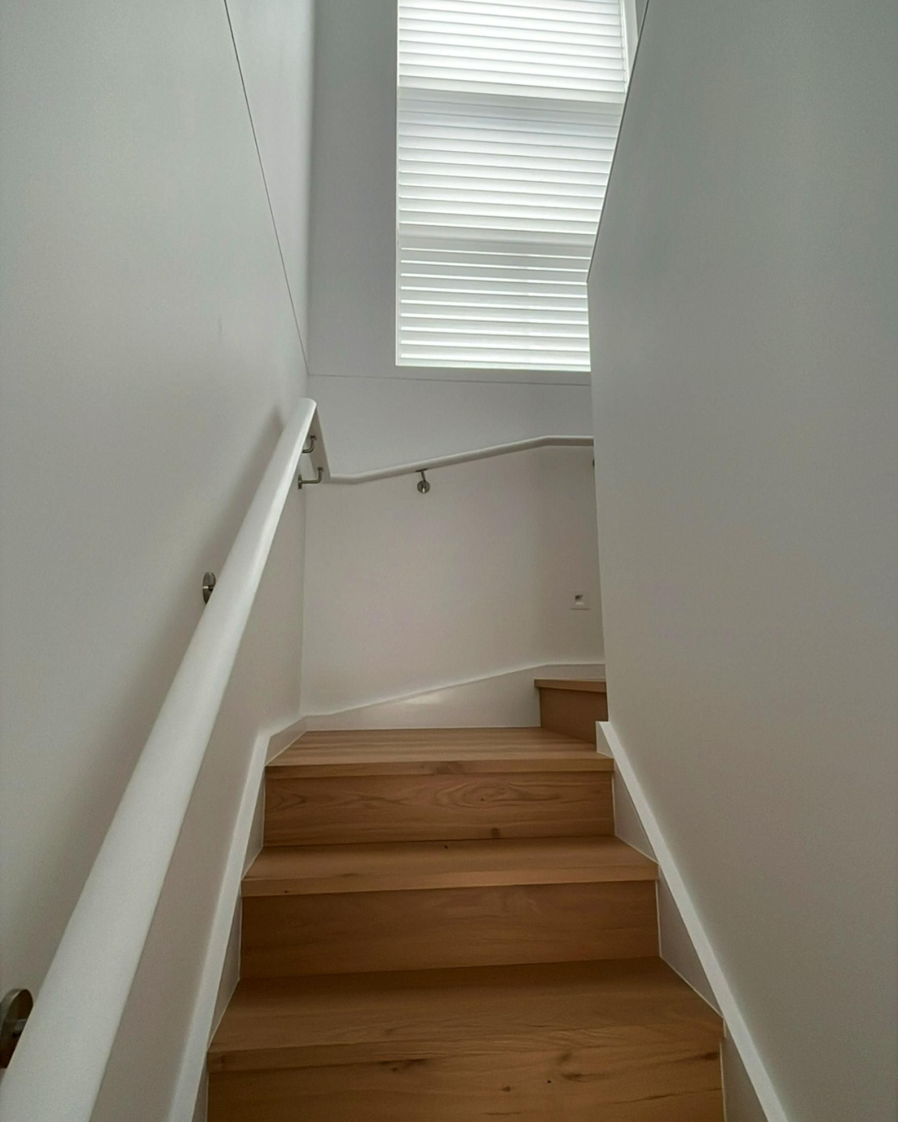 Wooden Stairs With White Walls And Blinds — JSF Interiors Goulburn in Goulburn, NSW