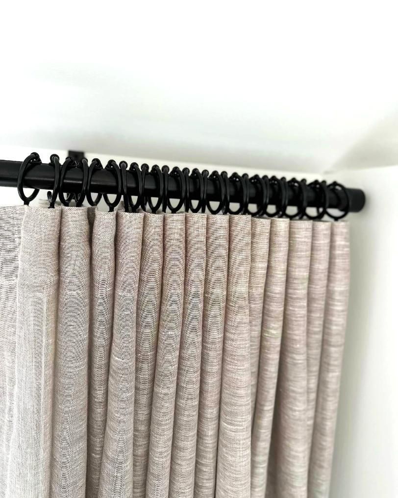 Tan Pleated Curtains On Black Rod — JSF Interiors Goulburn in Moss Vale, NSW