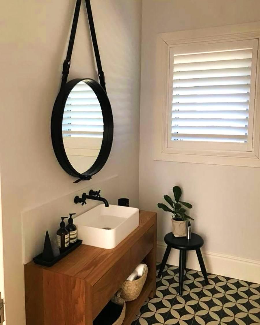 Bathroom With Wooden Vanity And Black Faucet — JSF Interiors Goulburn in Southern Highlands, NSW