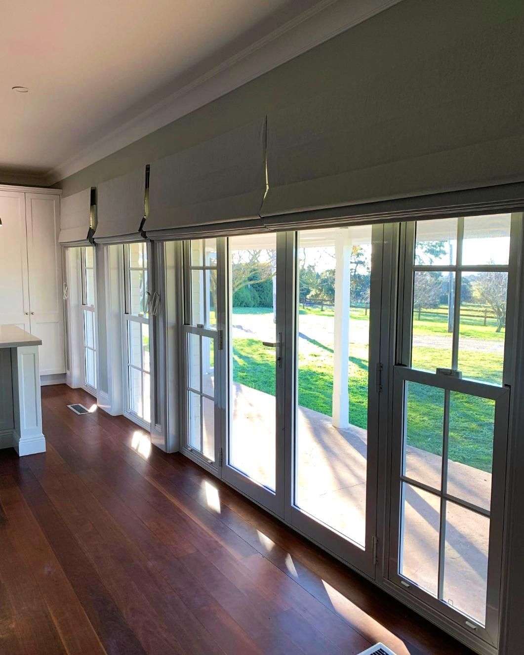 Room With Large Windows And Sheer Curtains — JSF Interiors Goulburn in Dapto, NSW